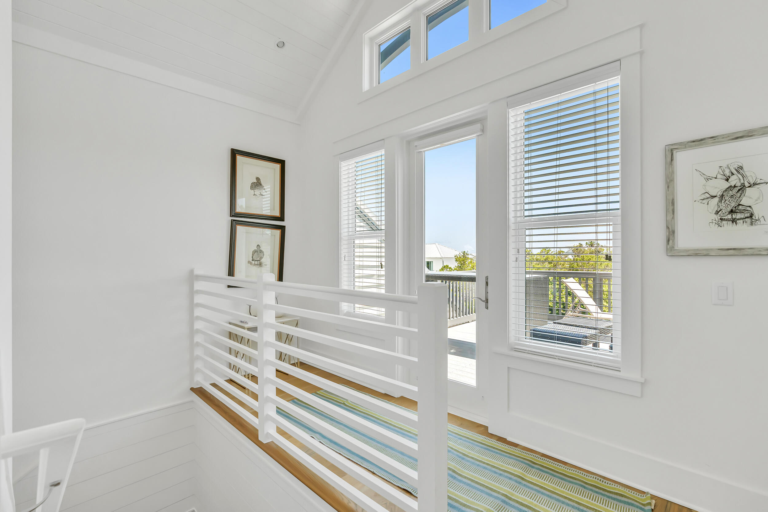 84 Pine Crest Circle Inlet Beach, FL 32461 - Photo 59 of 74 a view of a bedroom with wooden floor and windows