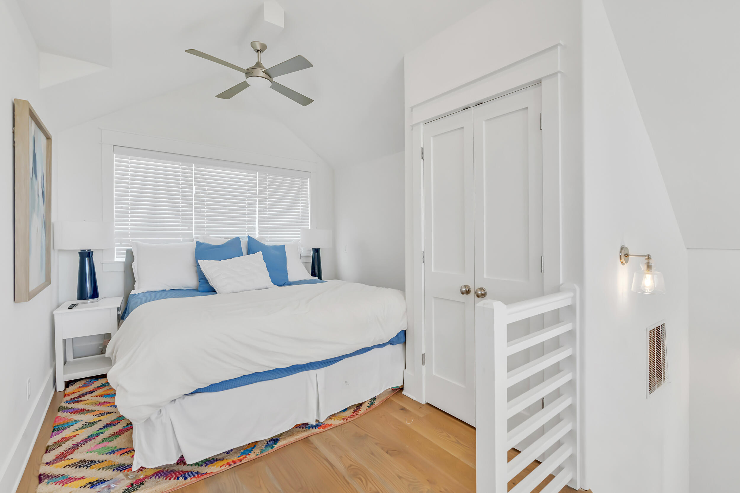 84 Pine Crest Circle Inlet Beach, FL 32461 - Photo 68 of 74 a bedroom with a bed and a chandelier