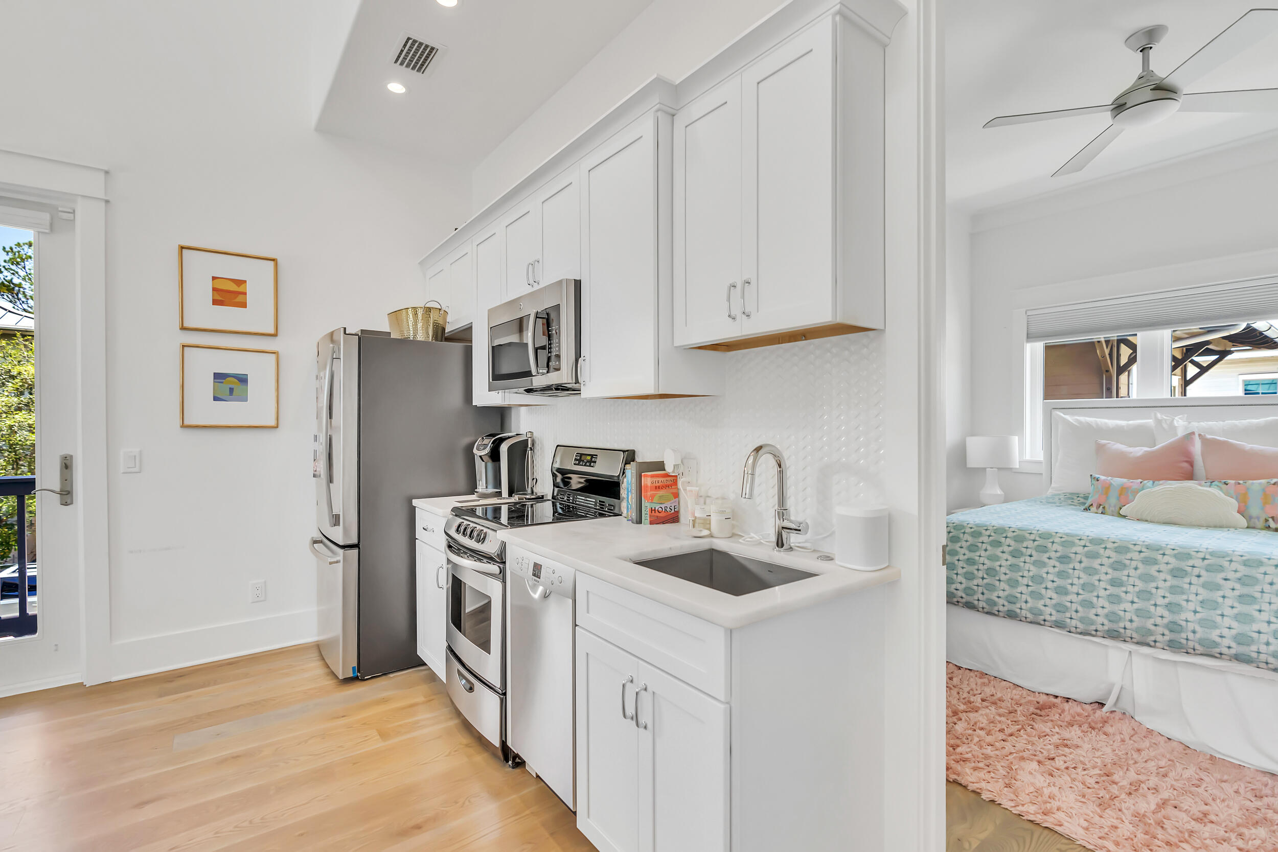 84 Pine Crest Circle Inlet Beach, FL 32461 - Photo 71 of 74 a kitchen with stainless steel appliances granite countertop a refrigerator stove and sink