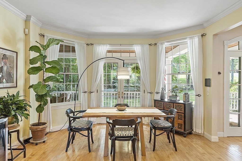 100 West Berlin Road Bolton, MA 01740 - Photo 18 of 42 a view of a dining room with furniture window and wooden floor