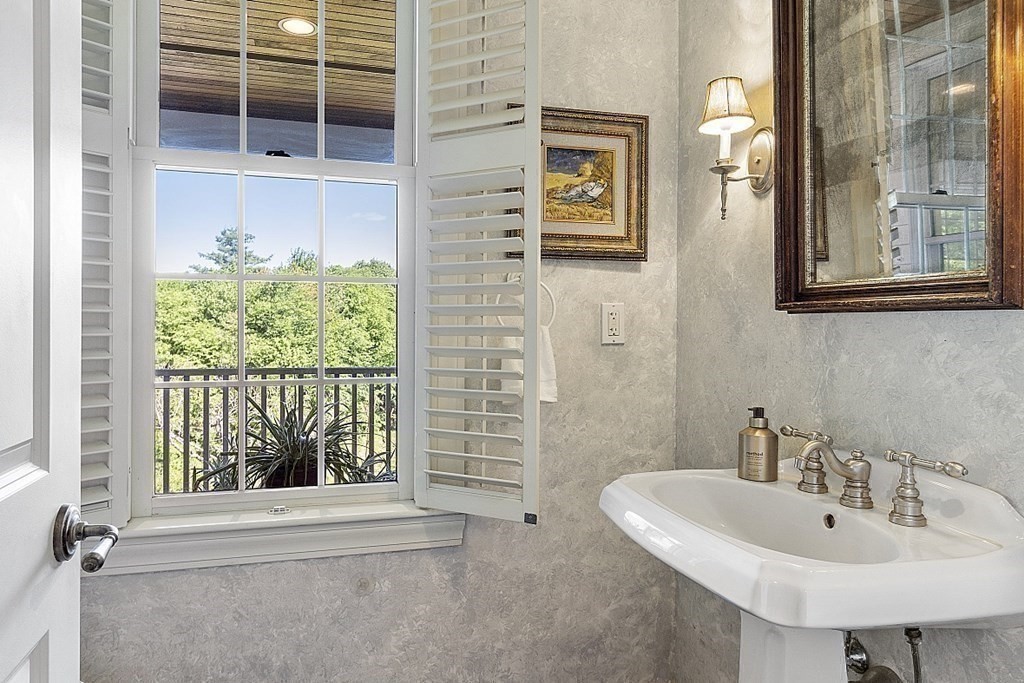 100 West Berlin Road Bolton, MA 01740 - Photo 21 of 42 a bathroom with a sink and a window