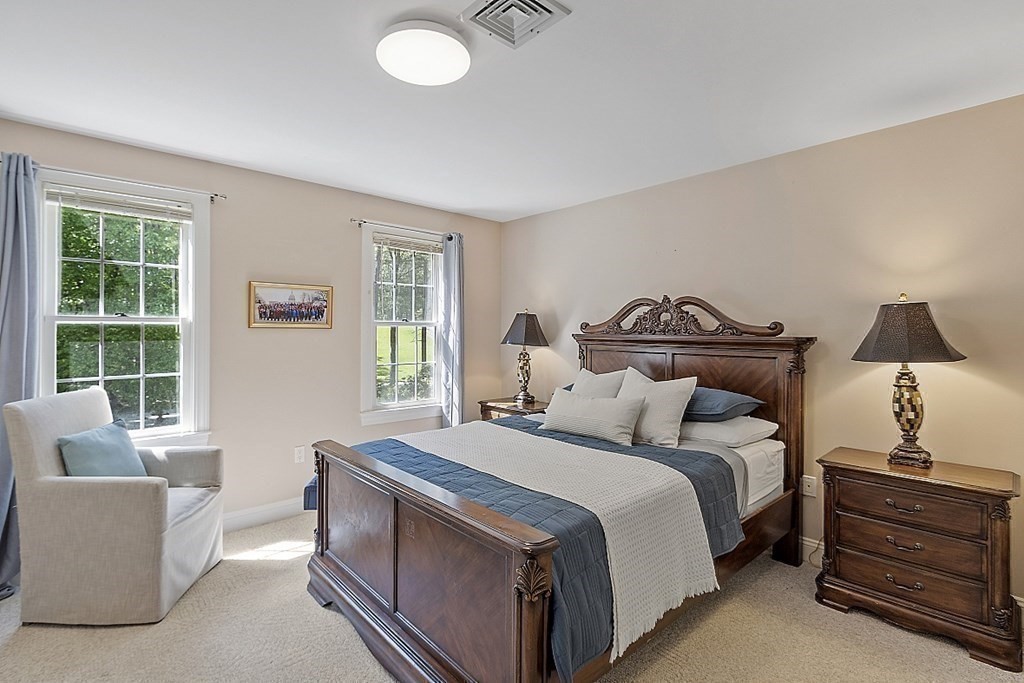 100 West Berlin Road Bolton, MA 01740 - Photo 26 of 42 a bedroom with a bed and a window