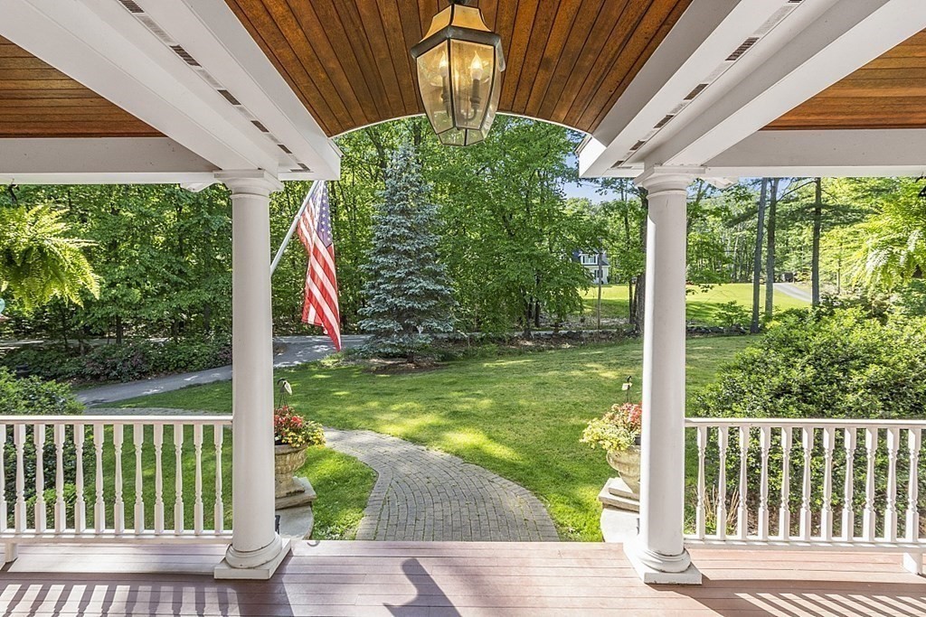 100 West Berlin Road Bolton, MA 01740 - Photo 4 of 42 a view of a garden with a small deck