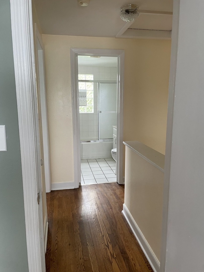 623 Waukegan Road Deerfield, IL 60015 - Photo 11 of 16 a bathroom with a sink and a toilet
