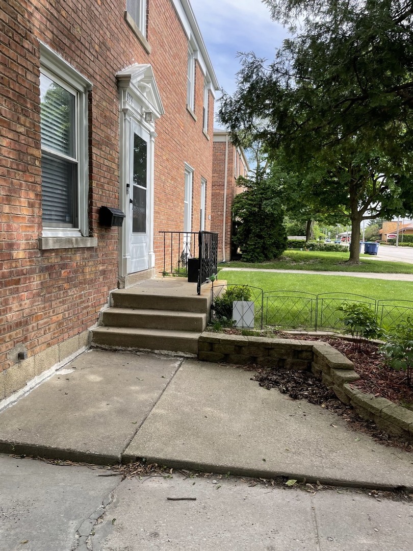623 Waukegan Road Deerfield, IL 60015 - Photo 2 of 16 a view of a house with a yard