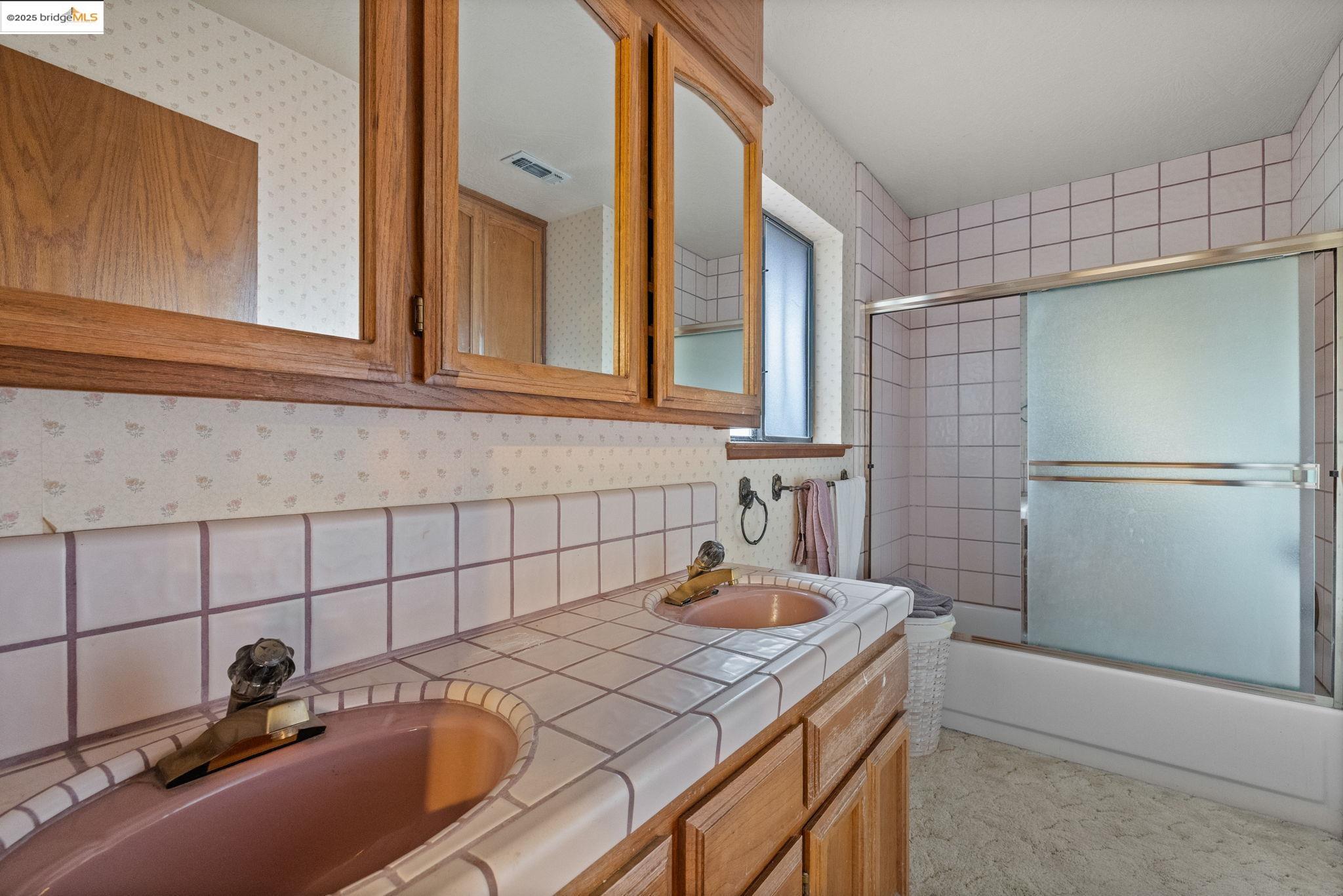 12087 Breckenridge Road Groveland, CA 95321 - Photo 15 of 31 a bathroom with a sink and a mirror