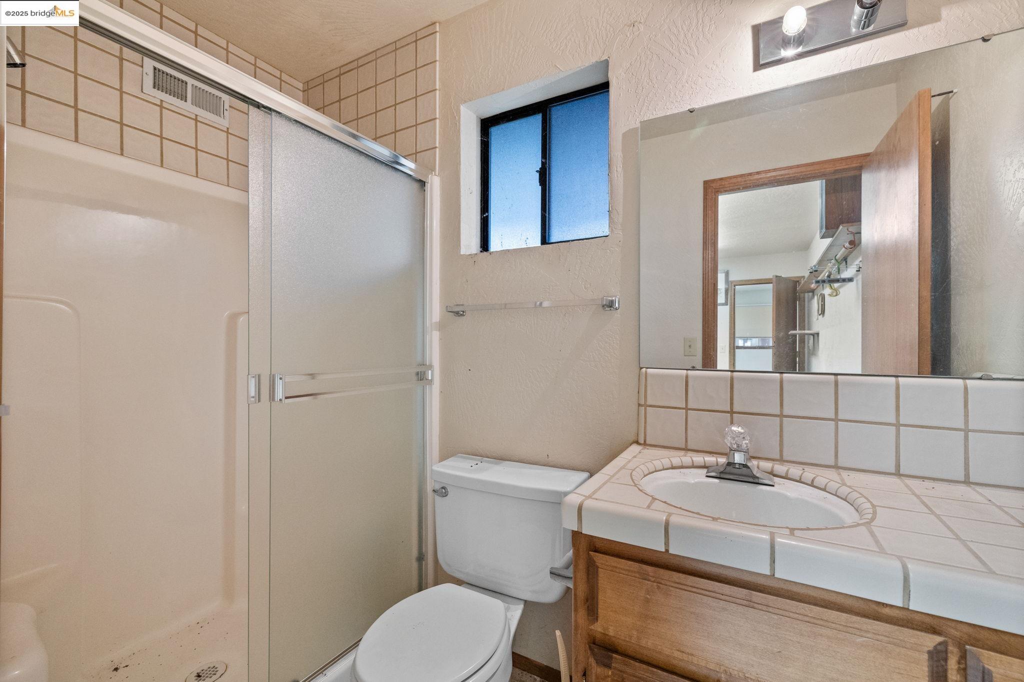 12087 Breckenridge Road Groveland, CA 95321 - Photo 19 of 31 a bathroom with a sink and toilet