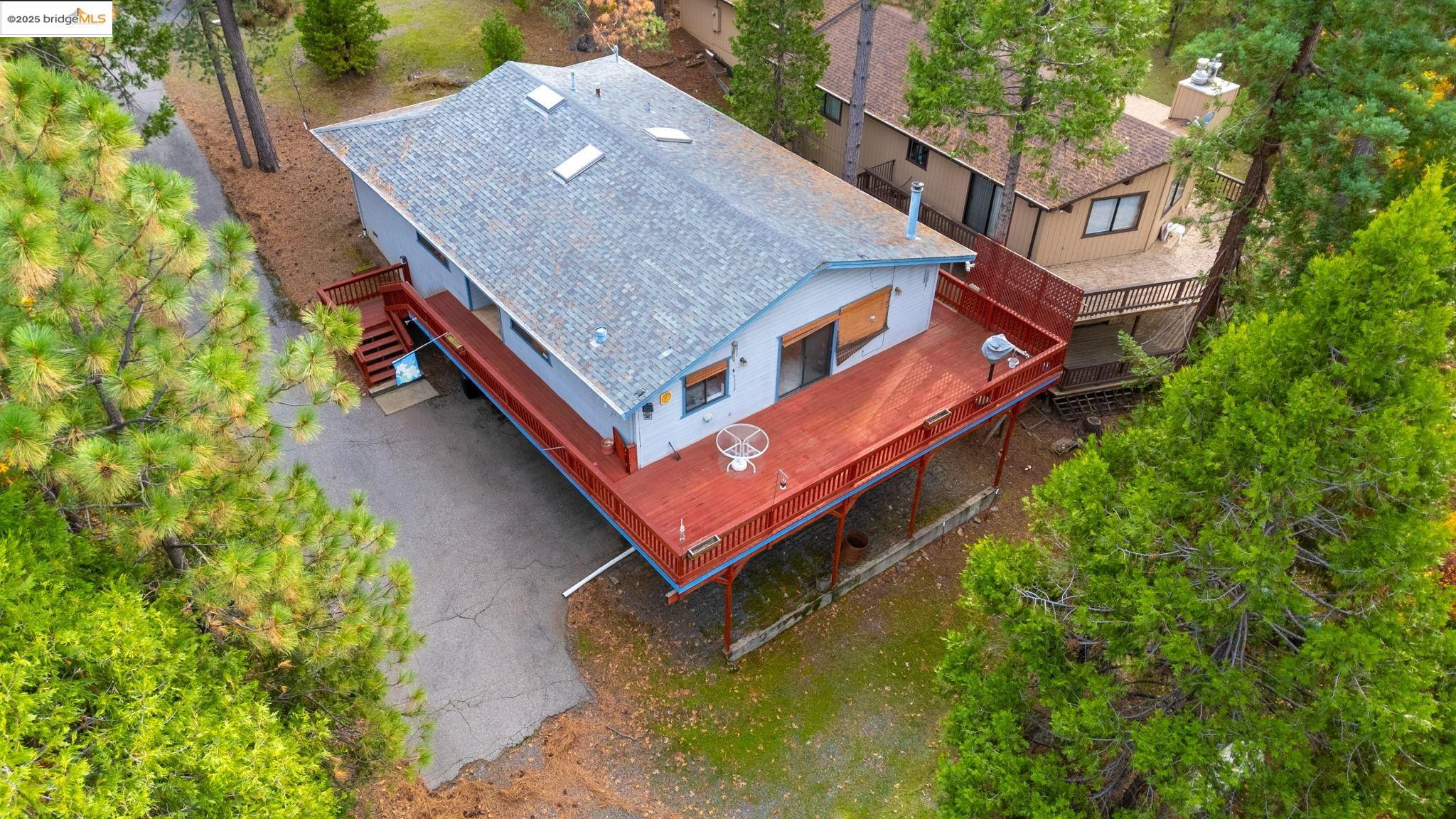 12087 Breckenridge Road Groveland, CA 95321 - Photo 27 of 31 an aerial view of a house with balcony