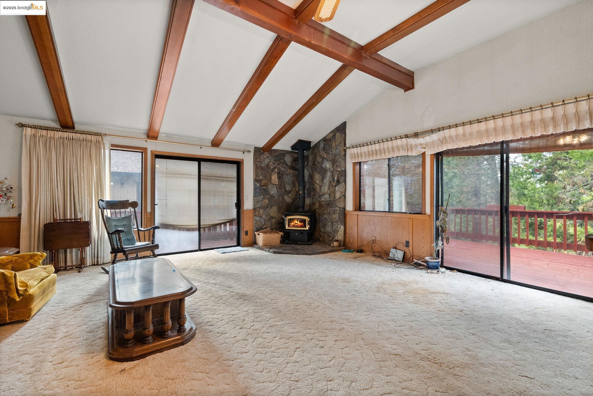 12087 Breckenridge Road Groveland, CA 95321 - Photo 8 of 31 a living room with furniture and a large window