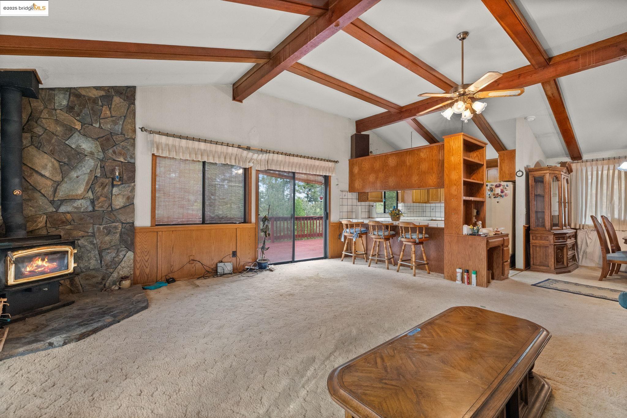 12087 Breckenridge Road Groveland, CA 95321 - Photo 9 of 31 a bed room with a bed and a chair