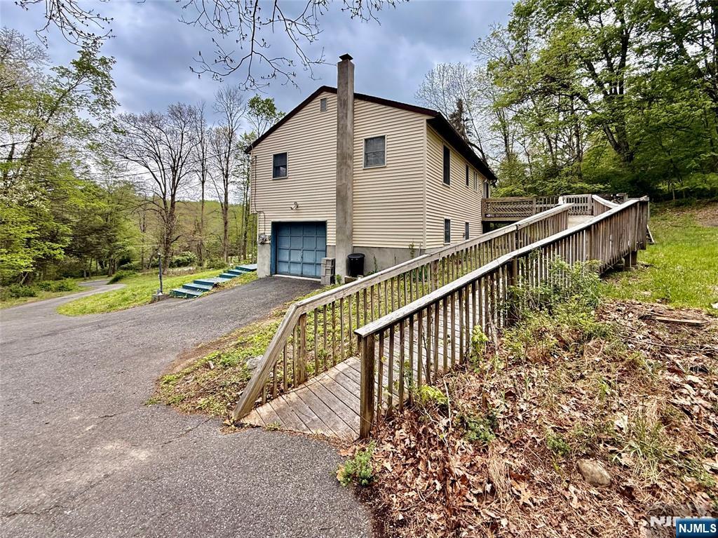 154 Cork Hill Road Franklin, NJ 07416 - Photo 29 of 35 a view of a house with a yard