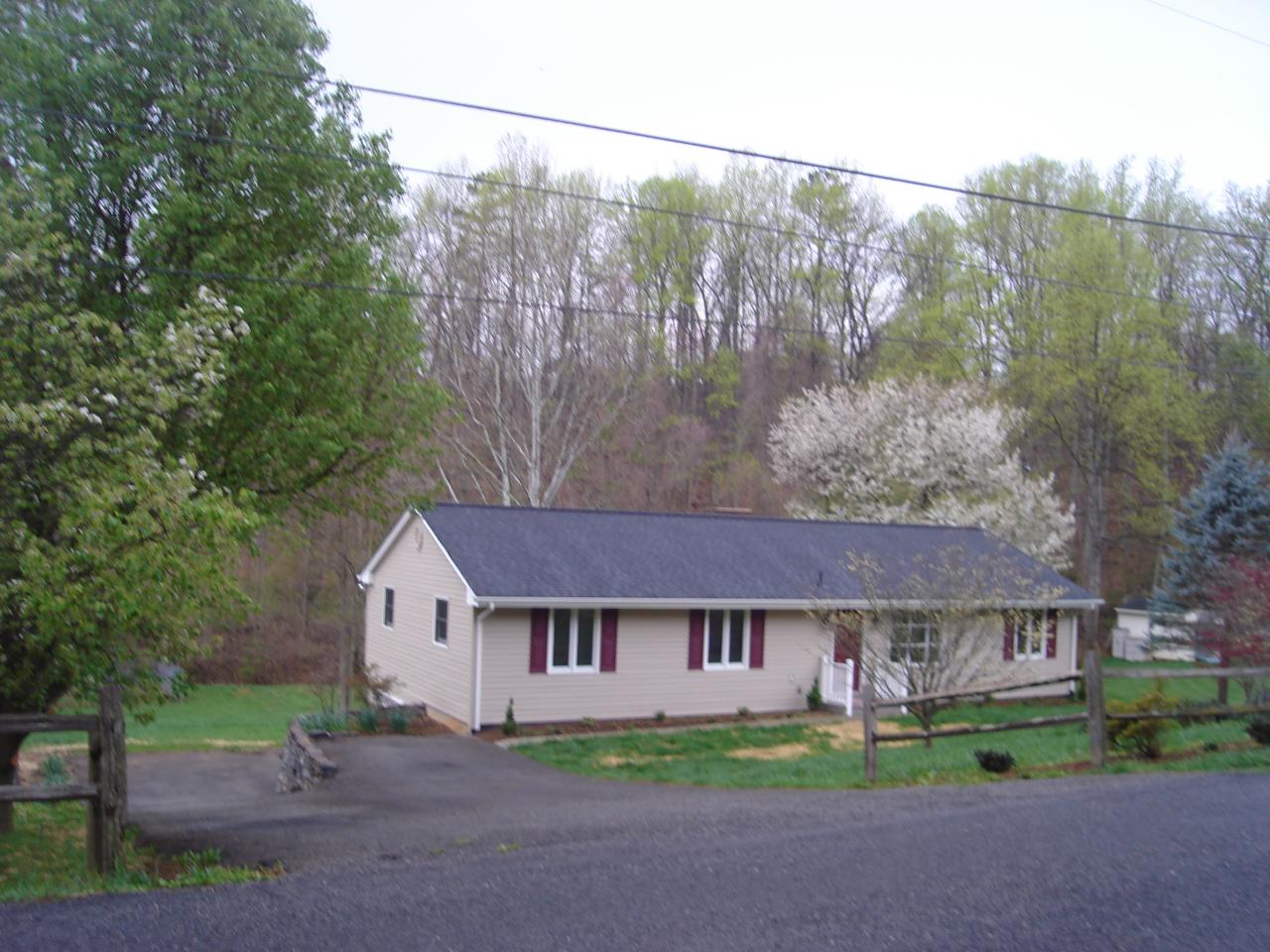 1109 Mountain Pass Road Blue Ridge, VA 24064 - Photo 3 of 18 front view of a house with a yard