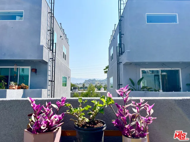 a front view of a house with an outdoor space