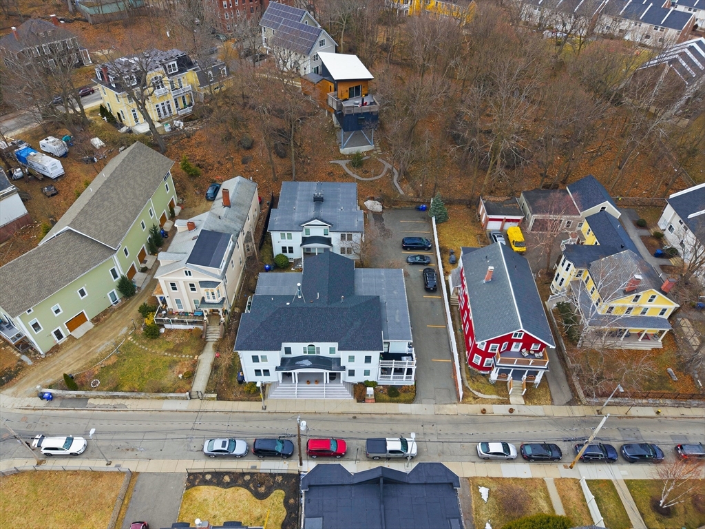 39 Hawthorne Street, Unit 39 Boston, MA 02119 - Photo 30 of 33 an aerial view of residential building with parking