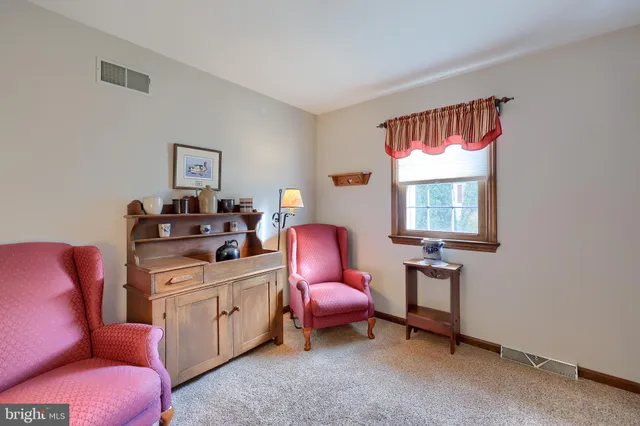 a room with furniture and a window