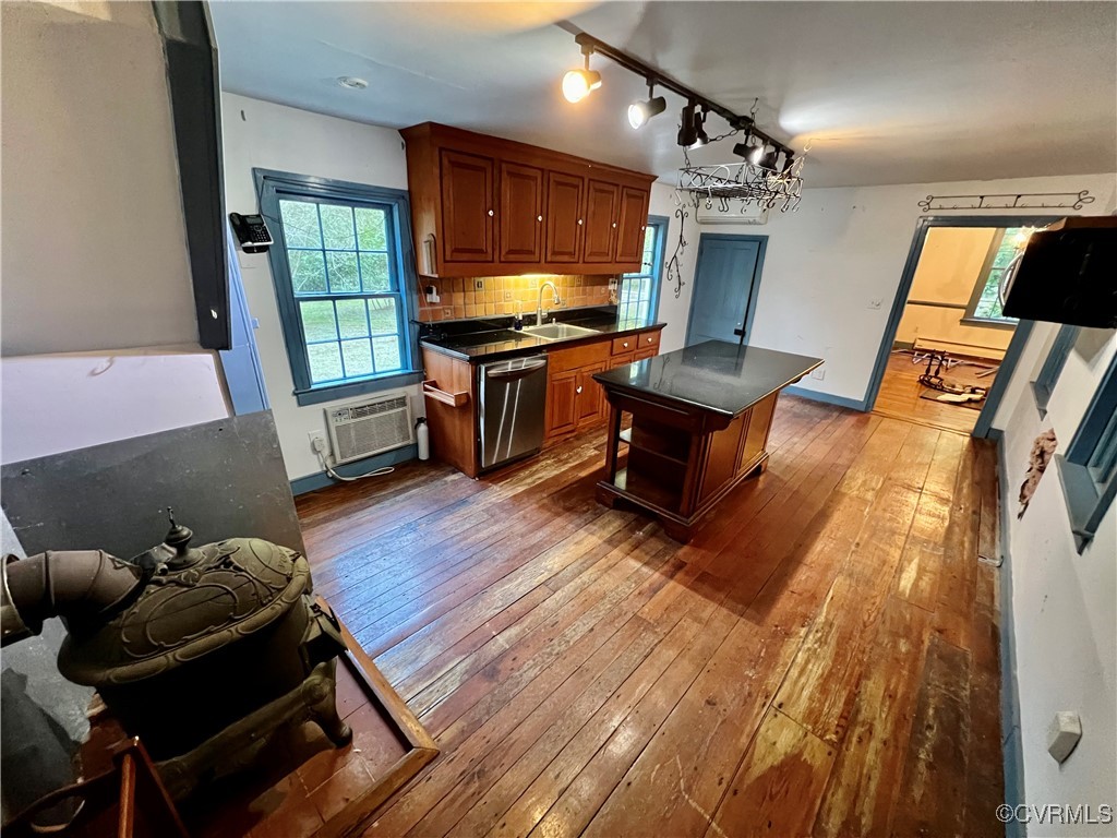 11075 Buckley Hall Road Mathews, VA 23109 - Photo 12 of 38 a living room with furniture and a wooden floor