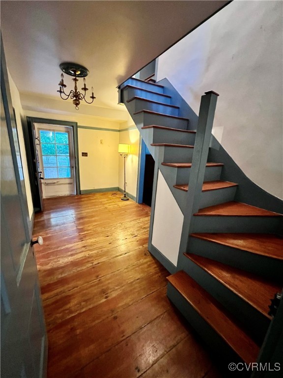 11075 Buckley Hall Road Mathews, VA 23109 - Photo 13 of 38 a view of entryway and hall with wooden floor