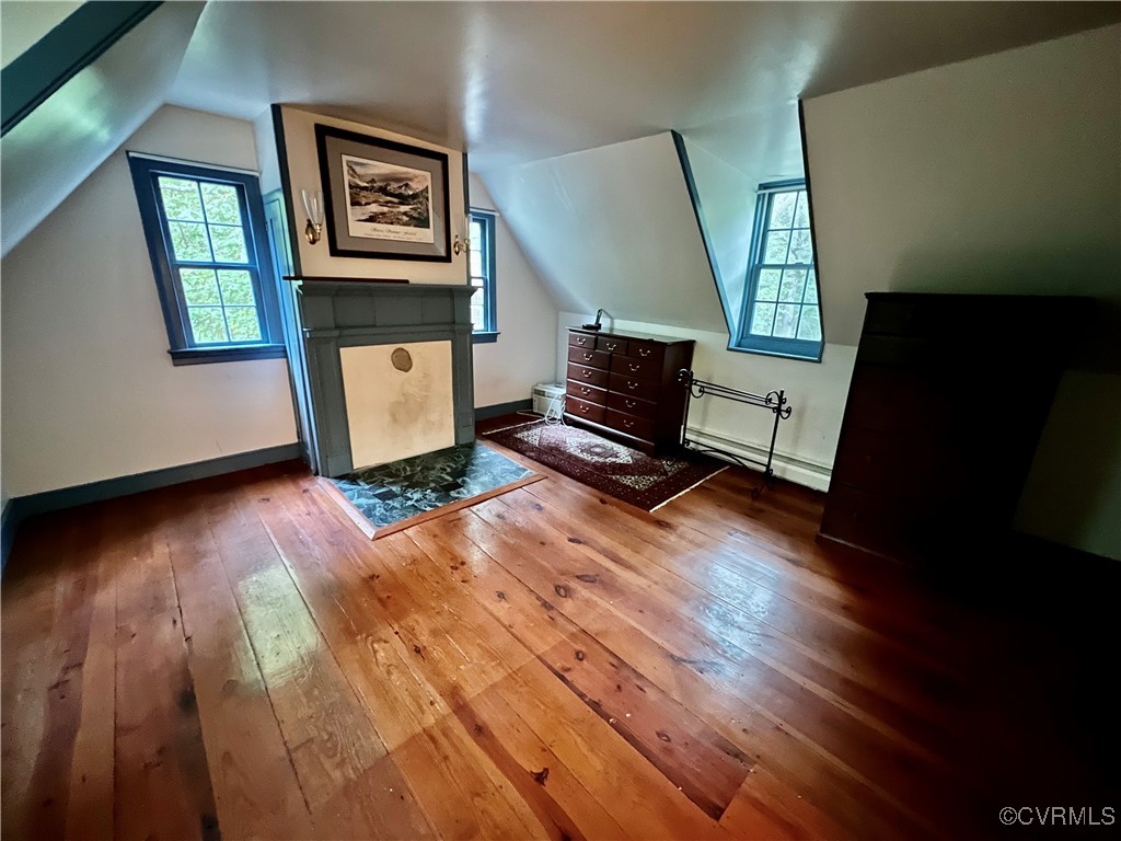 11075 Buckley Hall Road Mathews, VA 23109 - Photo 15 of 38 a living room with furniture and a fireplace