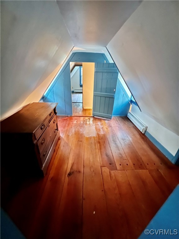 11075 Buckley Hall Road Mathews, VA 23109 - Photo 21 of 38 a view of an empty room with wooden floor and stairs