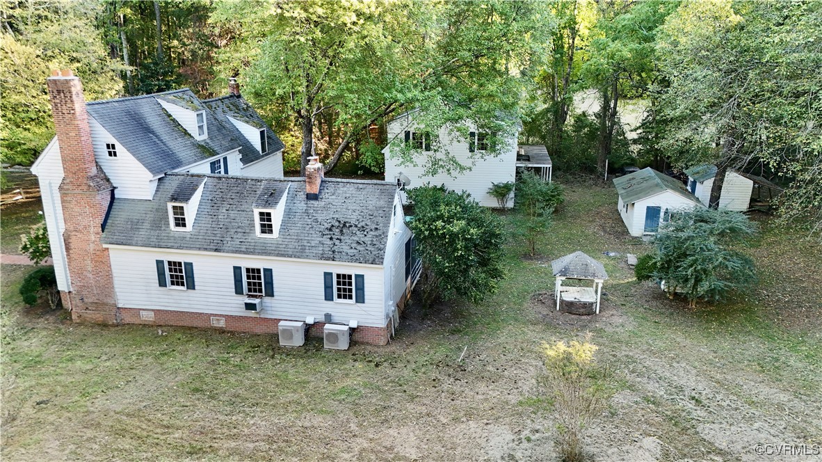 11075 Buckley Hall Road Mathews, VA 23109 - Photo 5 of 38 an aerial view of a house with a yard