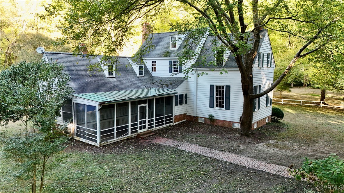 11075 Buckley Hall Road Mathews, VA 23109 - Photo 6 of 38 a view of a house with a yard
