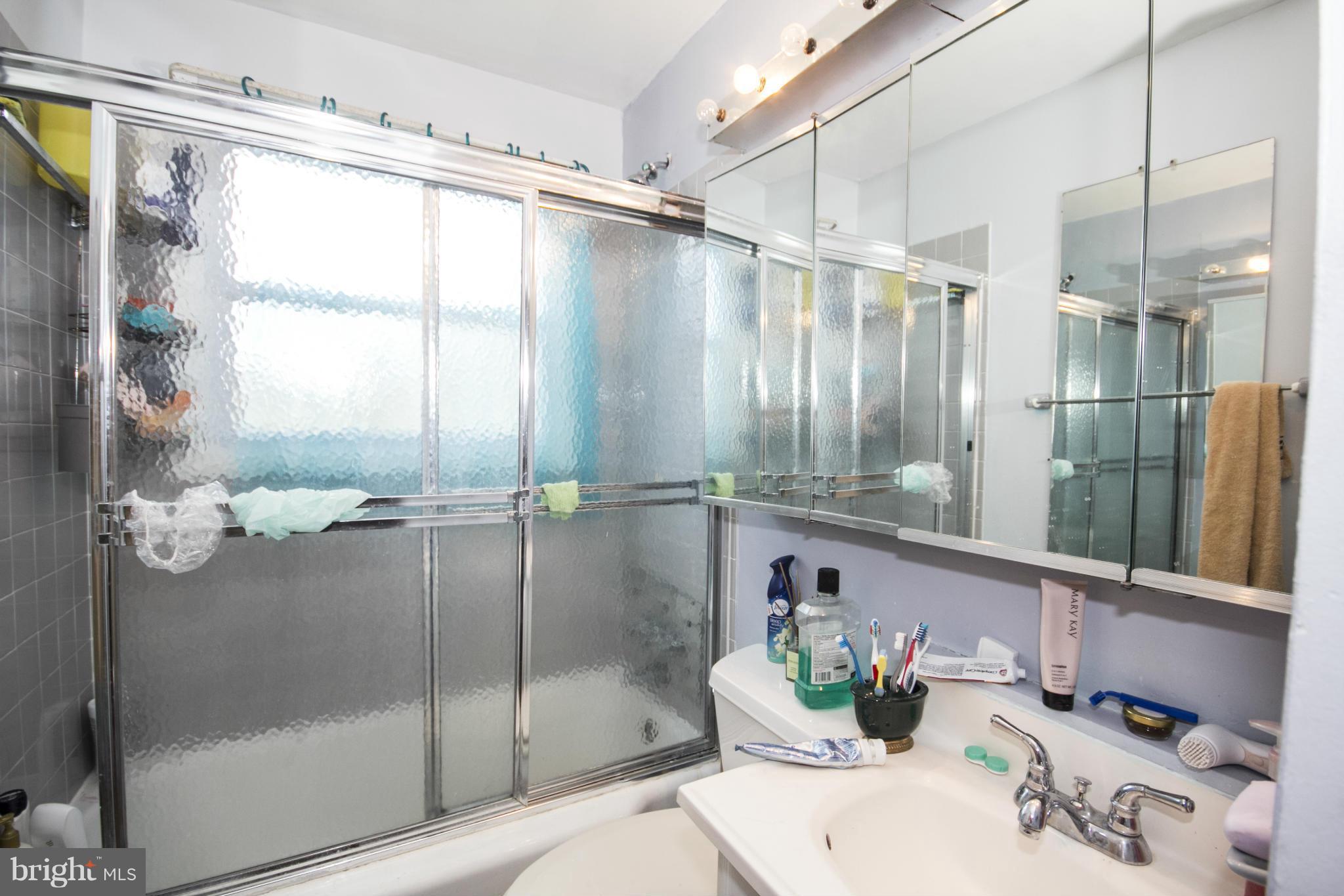 5108 Old Court Road Randallstown, MD 21133 - Photo 7 of 13 a bathroom with a shower and a sink