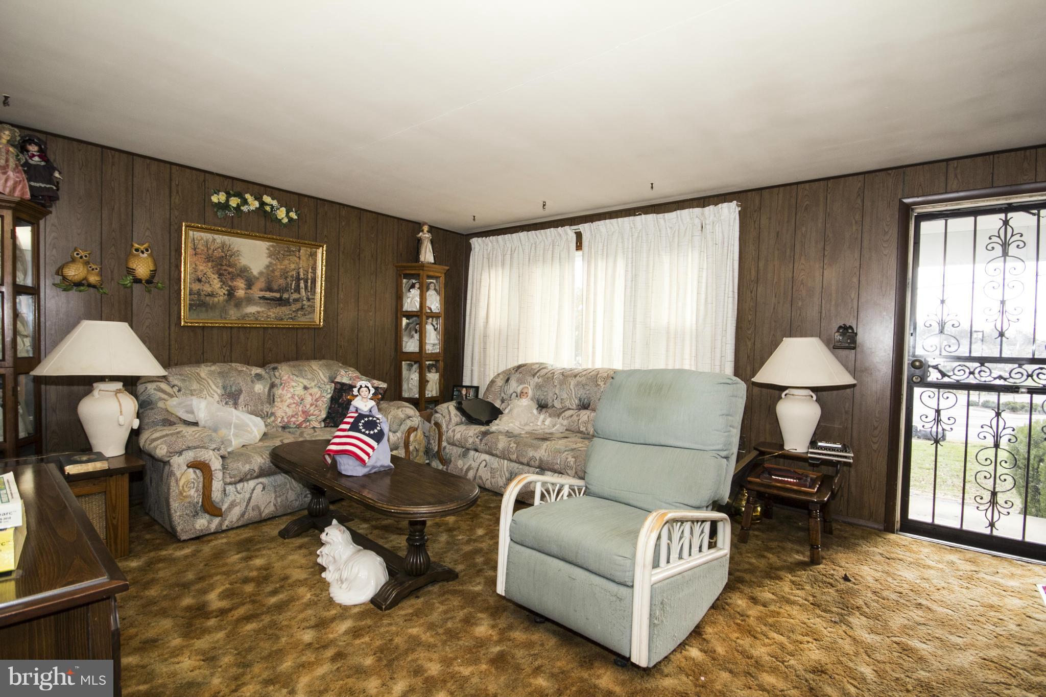 5108 Old Court Road Randallstown, MD 21133 - Photo 9 of 13 a living room with furniture and a window