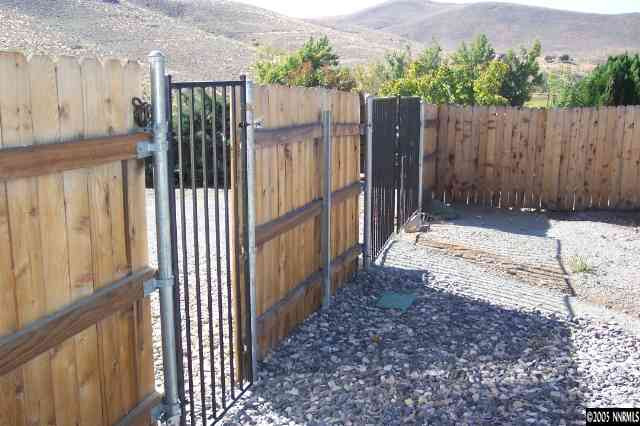 20595 Eaton Road Reno, NV 89521 - Photo 8 of 9 a view of wooden fence