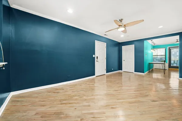 a view of an empty room and window