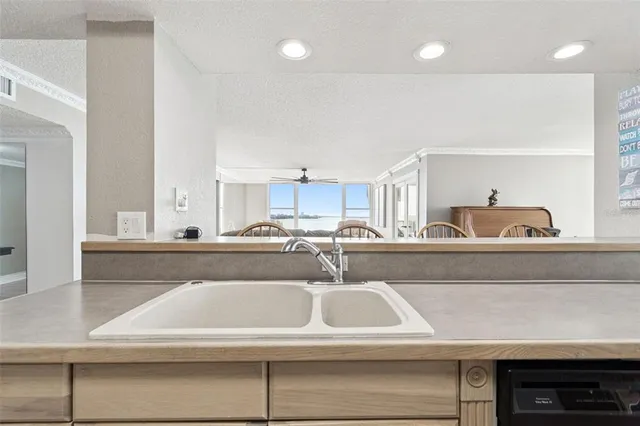 a bathroom with a double vanity sink mirror and toilet