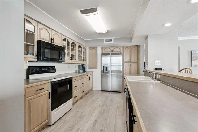 a bed room with furniture and a lamp