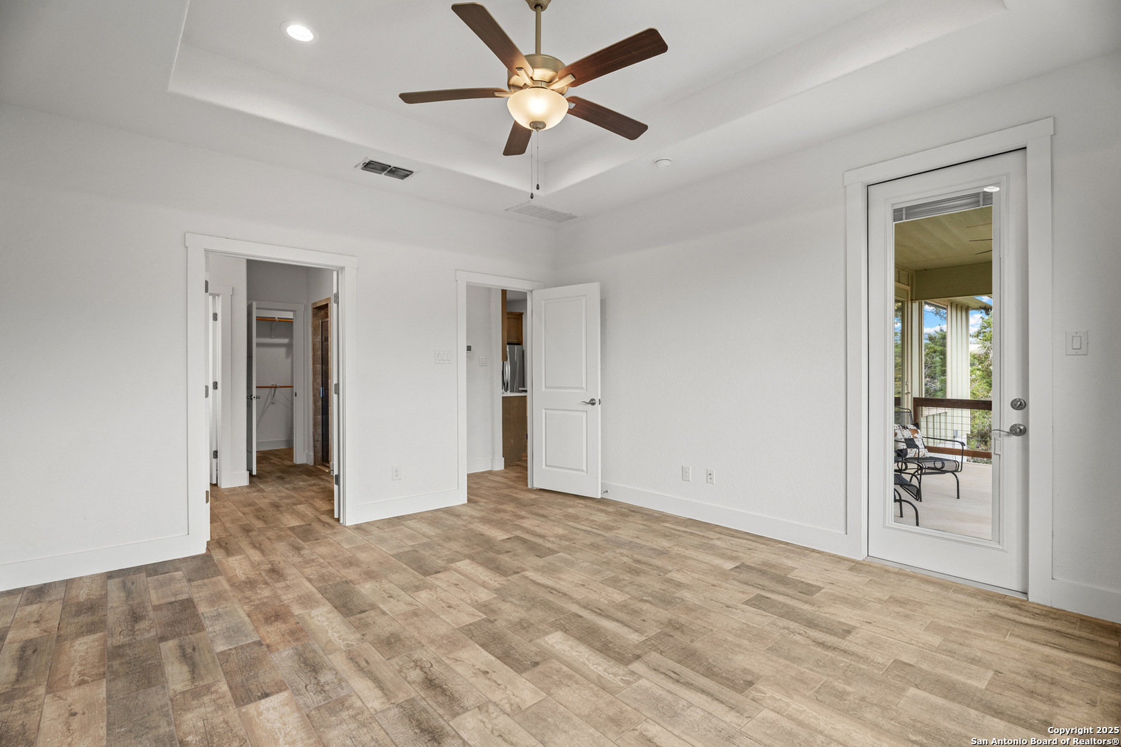 1039 Primrose Path Spring Branch, TX 78070 - Photo 16 of 30 an empty room with closet and a ceiling fan
