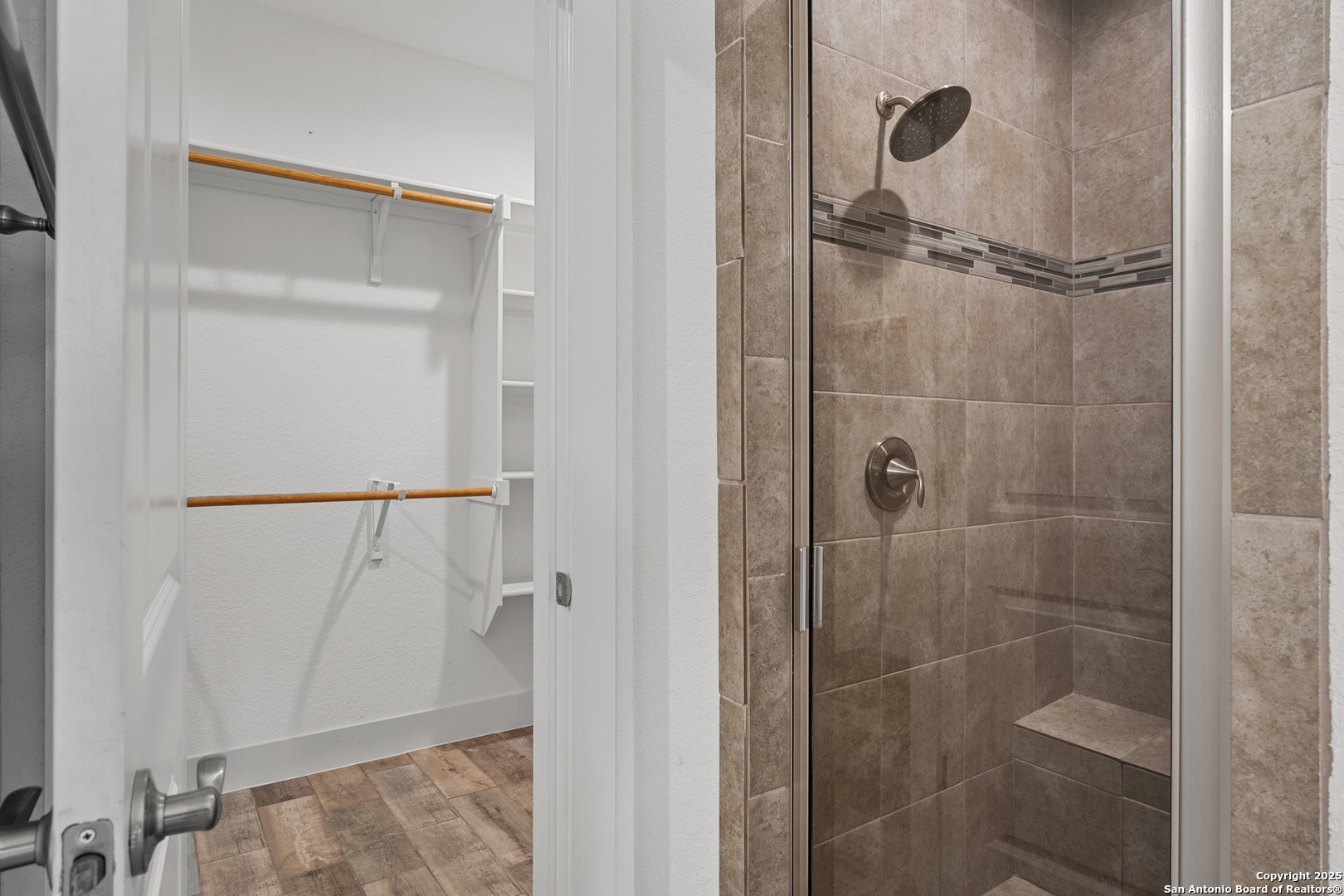 1039 Primrose Path Spring Branch, TX 78070 - Photo 18 of 30 a bathroom with a glass shower door