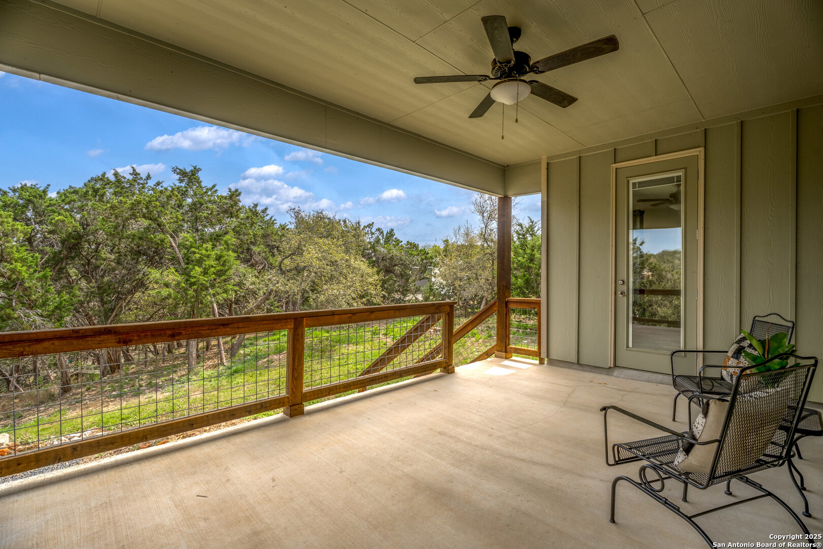1039 Primrose Path Spring Branch, TX 78070 - Photo 22 of 30 a view of a floor to ceiling window and an outdoor view