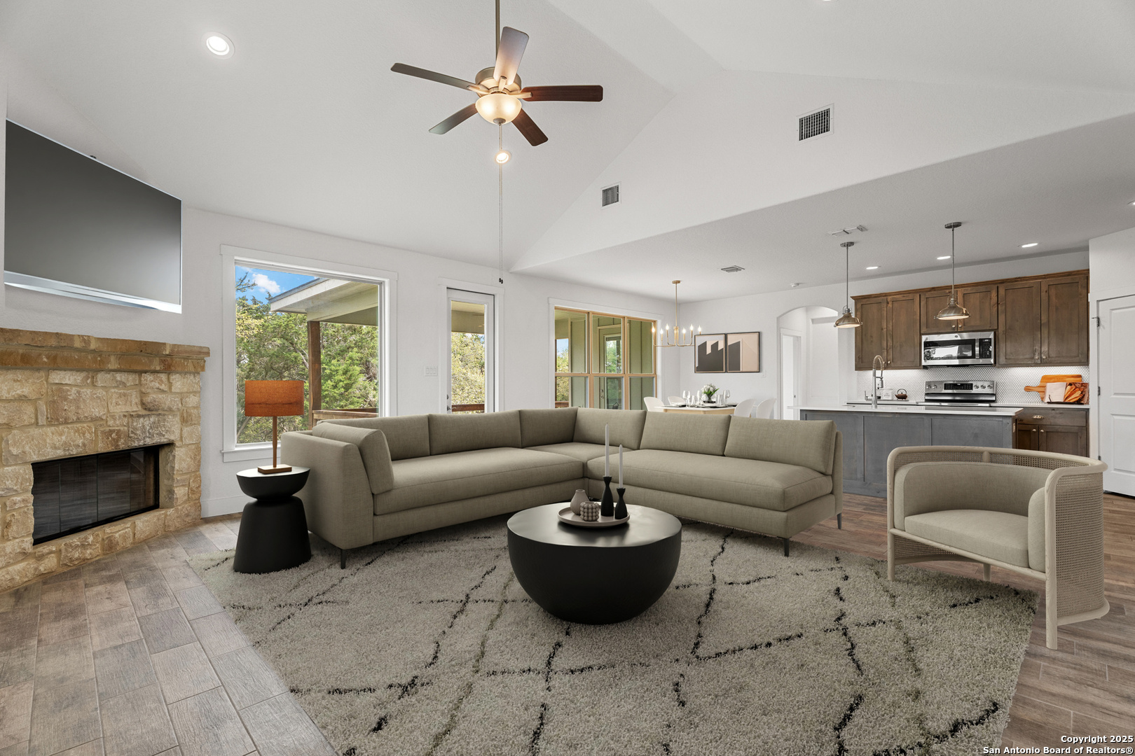 1039 Primrose Path Spring Branch, TX 78070 - Photo 8 of 30 a living room with furniture and a fireplace