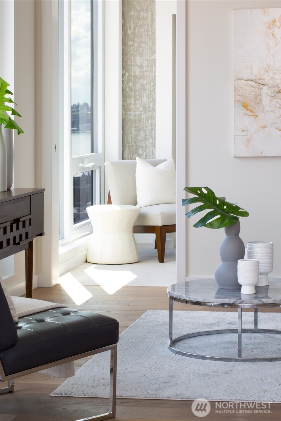 450 South Main Street, Unit 407 Seattle, WA 98104 - Photo 7 of 25 a living room with furniture and a potted plant