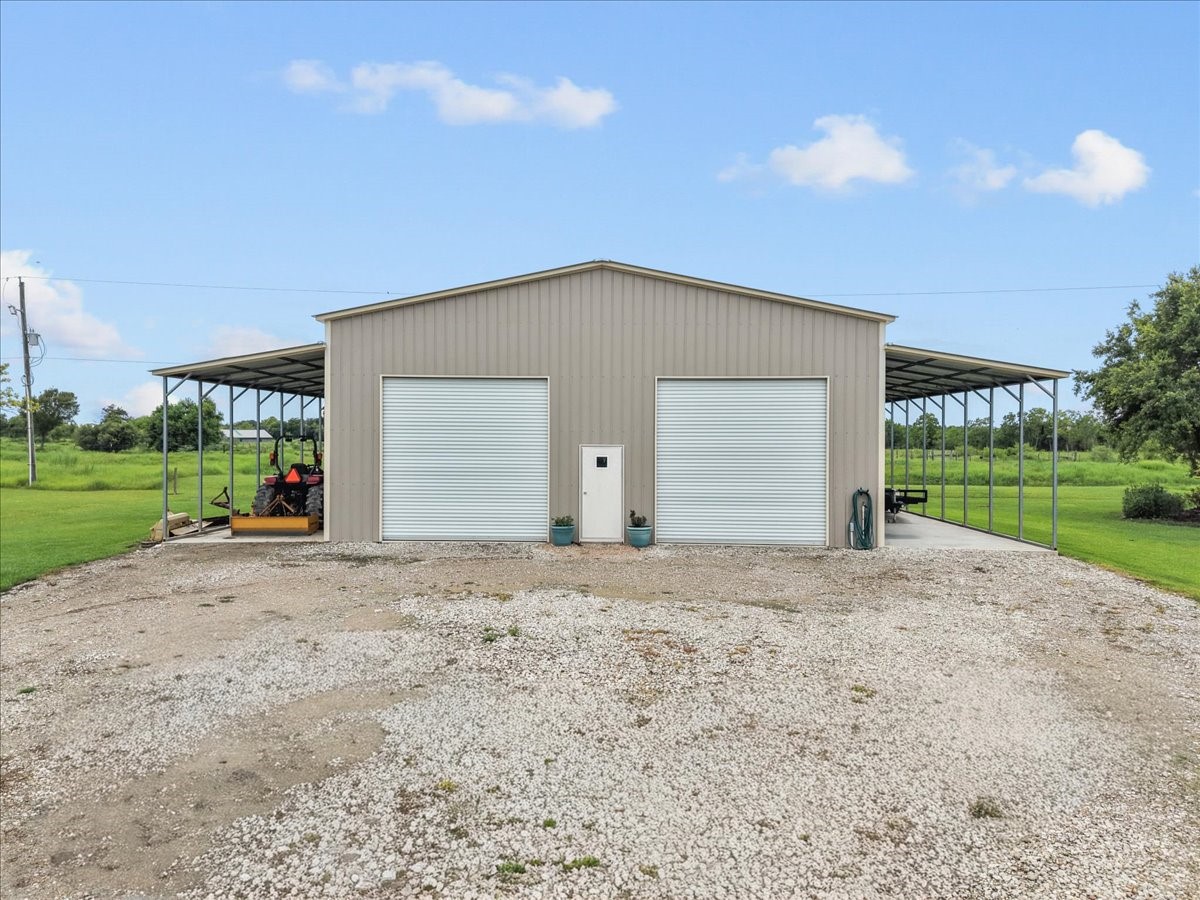 8710 Fm 646 Road South Santa Fe, TX 77510 - Photo 22 of 32 Amazing 40x40 shop with utilities ready to go, providing the perfect space for work, storage, or recreational use