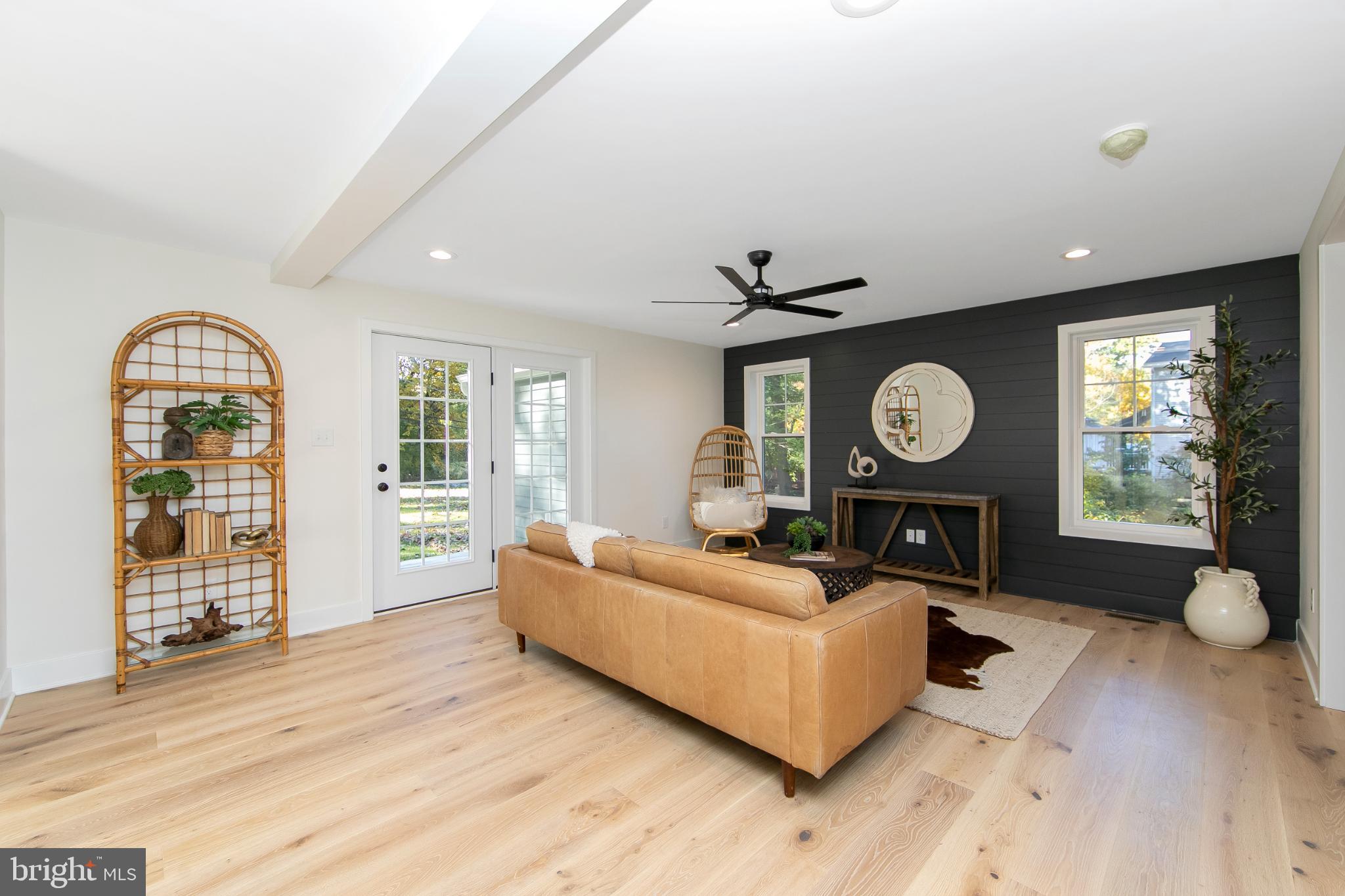 22 Scenic Road Springfield, PA 19064 - Photo 17 of 56 a living room with furniture and a window