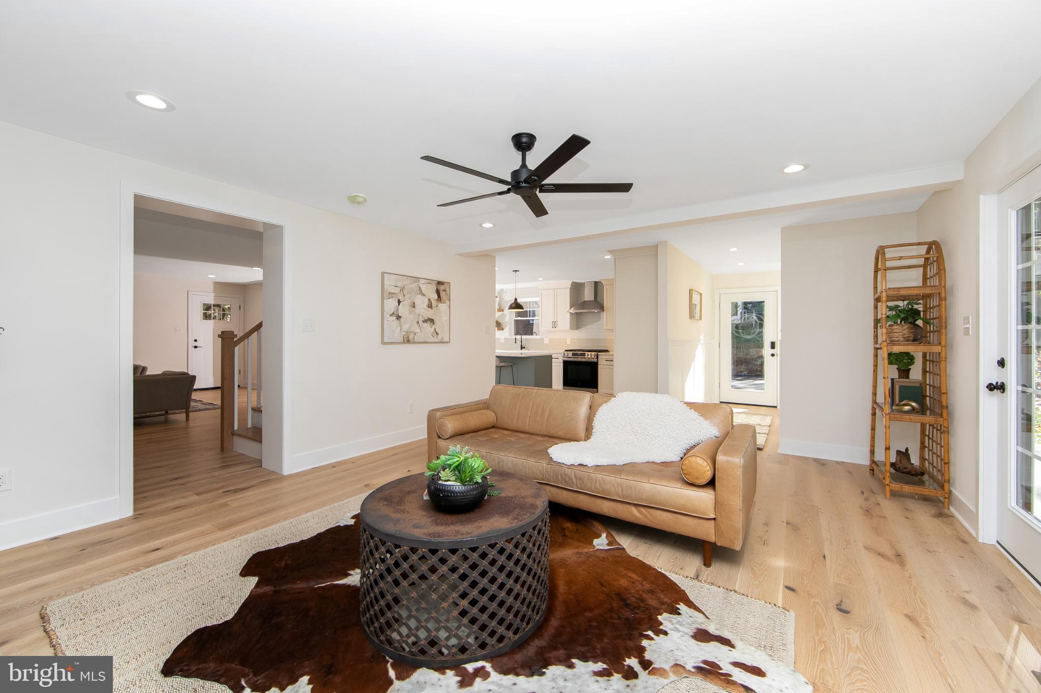 22 Scenic Road Springfield, PA 19064 - Photo 19 of 56 a living room with furniture and wooden floor