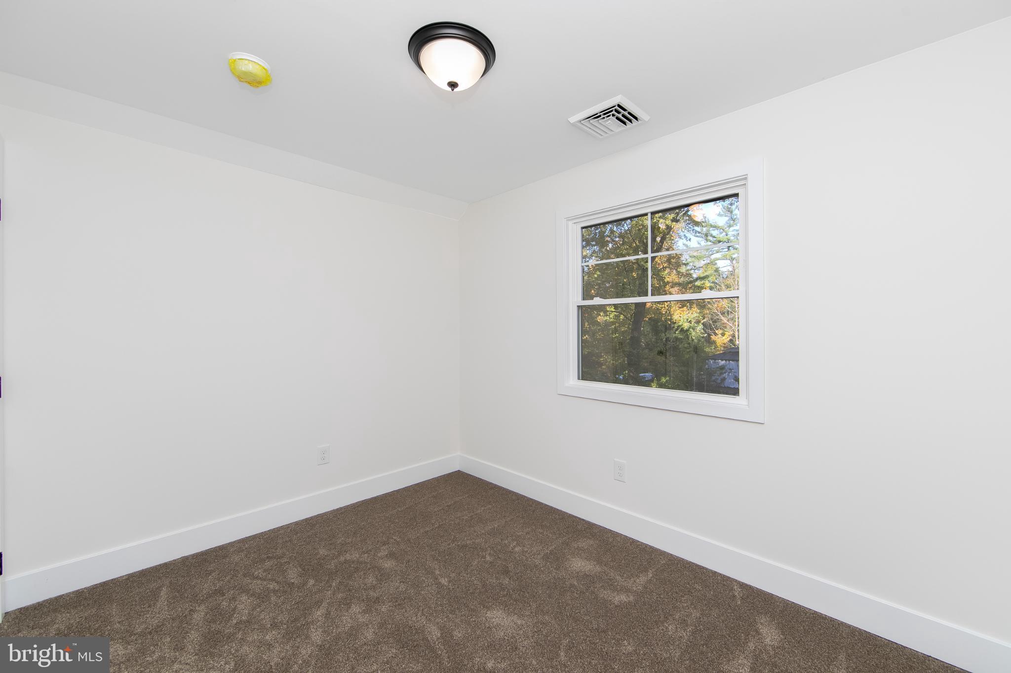 22 Scenic Road Springfield, PA 19064 - Photo 35 of 56 an empty room with windows
