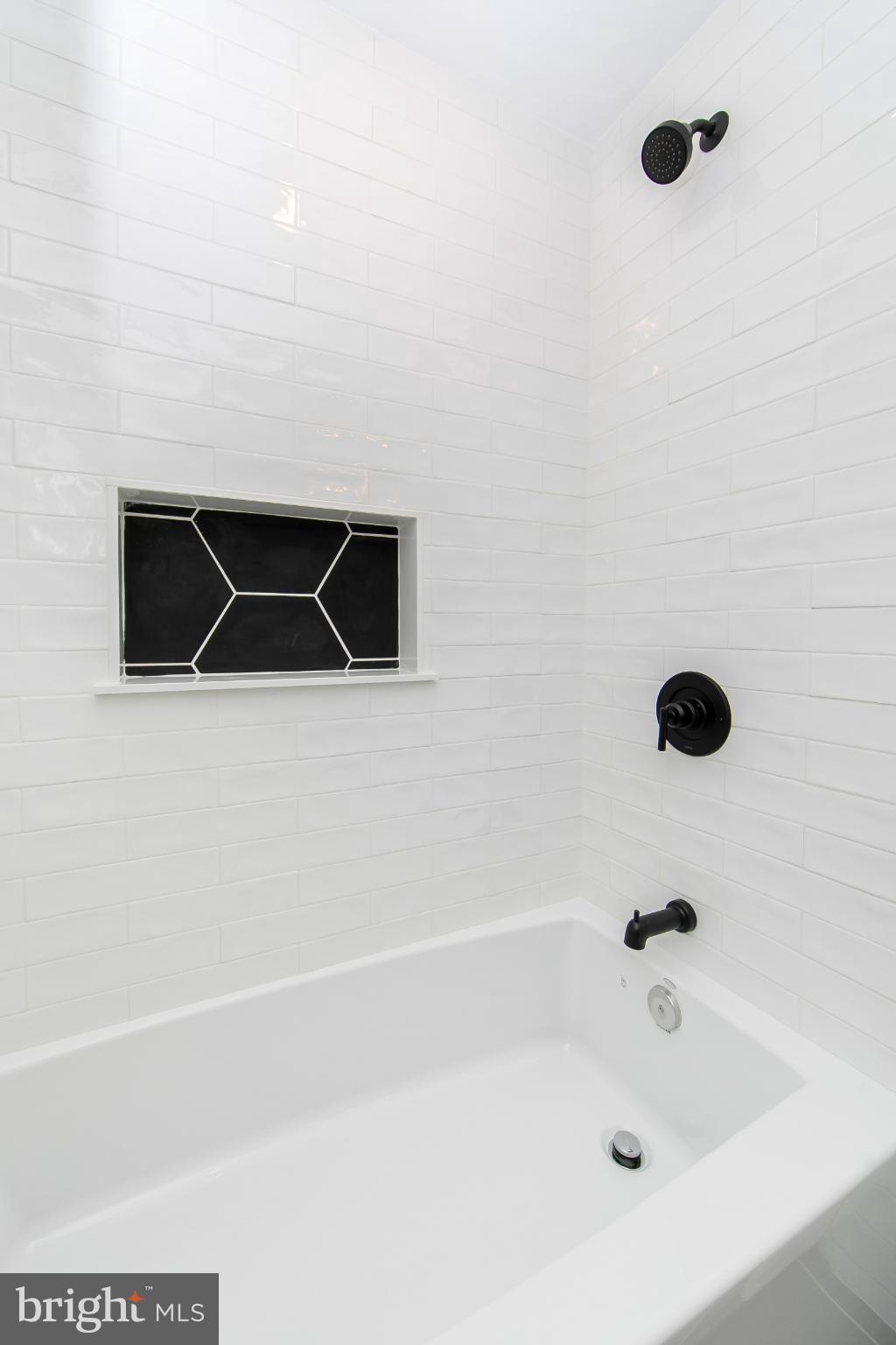 22 Scenic Road Springfield, PA 19064 - Photo 38 of 56 a bathroom with a bathtub