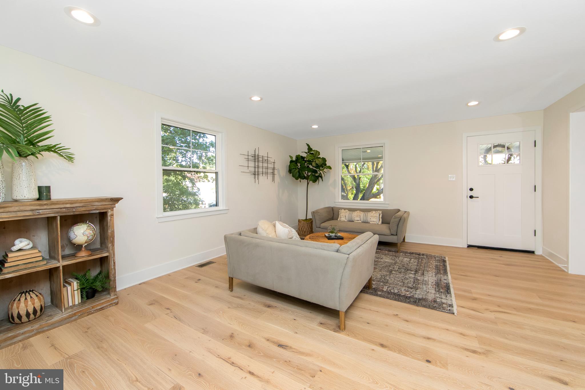 22 Scenic Road Springfield, PA 19064 - Photo 9 of 56 a living room with furniture and a window