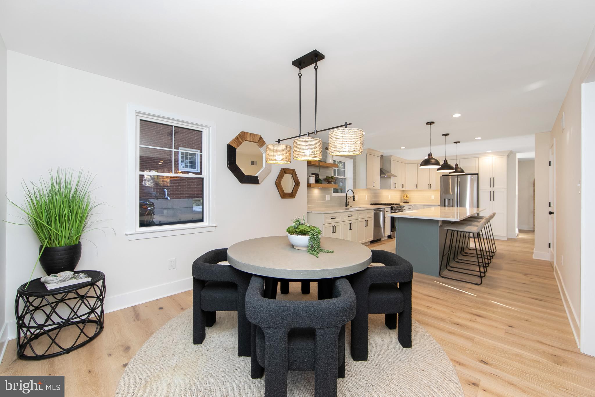 22 Scenic Road Springfield, PA 19064 - Photo 10 of 56 a view of a dining room with furniture and wooden floor