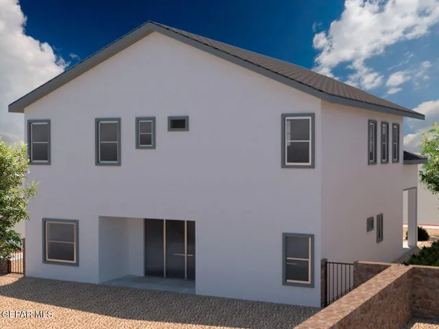 a front view of a house with seating space