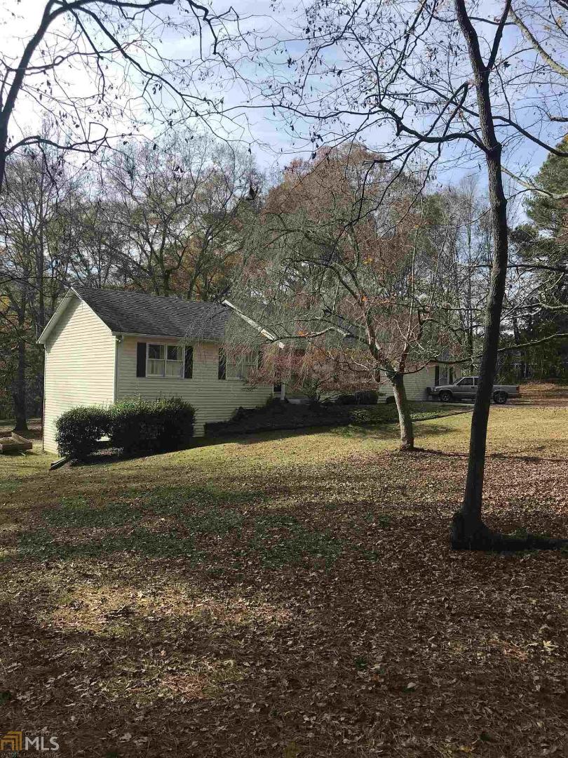 2640 Bold Springs Road Monroe, GA 30656 - Photo 1 of 1 a view of a house with backyard and trees
