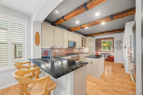 a kitchen with granite countertop lots of counter top space