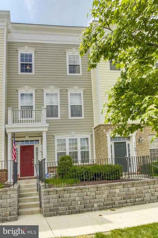 11603 Leesborough Circle Silver Spring, MD 20902 - Photo 1 of 30 a front view of a house with garden