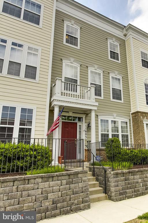 11603 Leesborough Circle Silver Spring, MD 20902 - Photo 2 of 30 a front view of a house with a yard