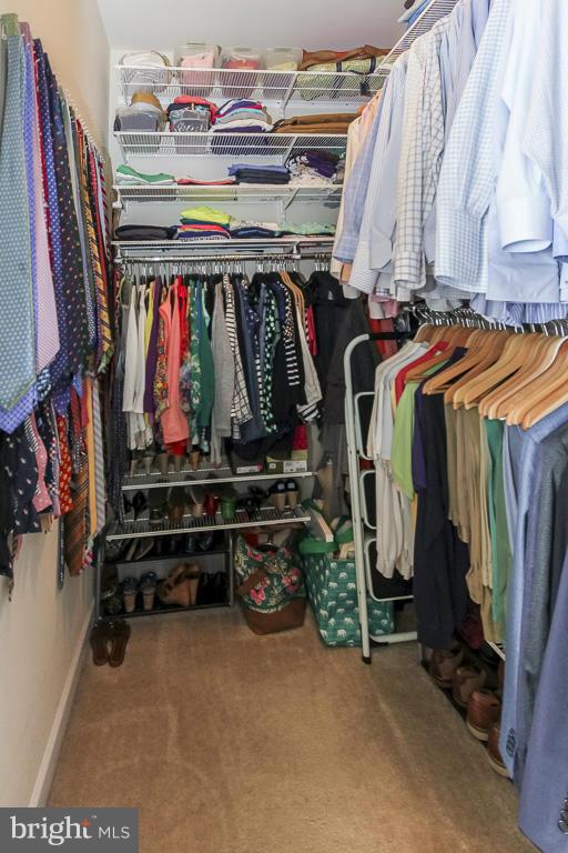 11603 Leesborough Circle Silver Spring, MD 20902 - Photo 16 of 30 a view of walk in closet with clothes