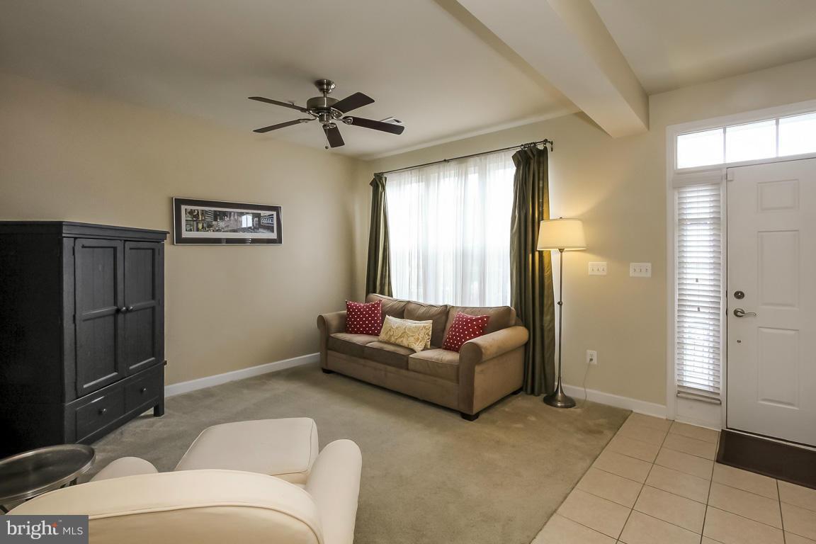11603 Leesborough Circle Silver Spring, MD 20902 - Photo 24 of 30 a living room with furniture and a window